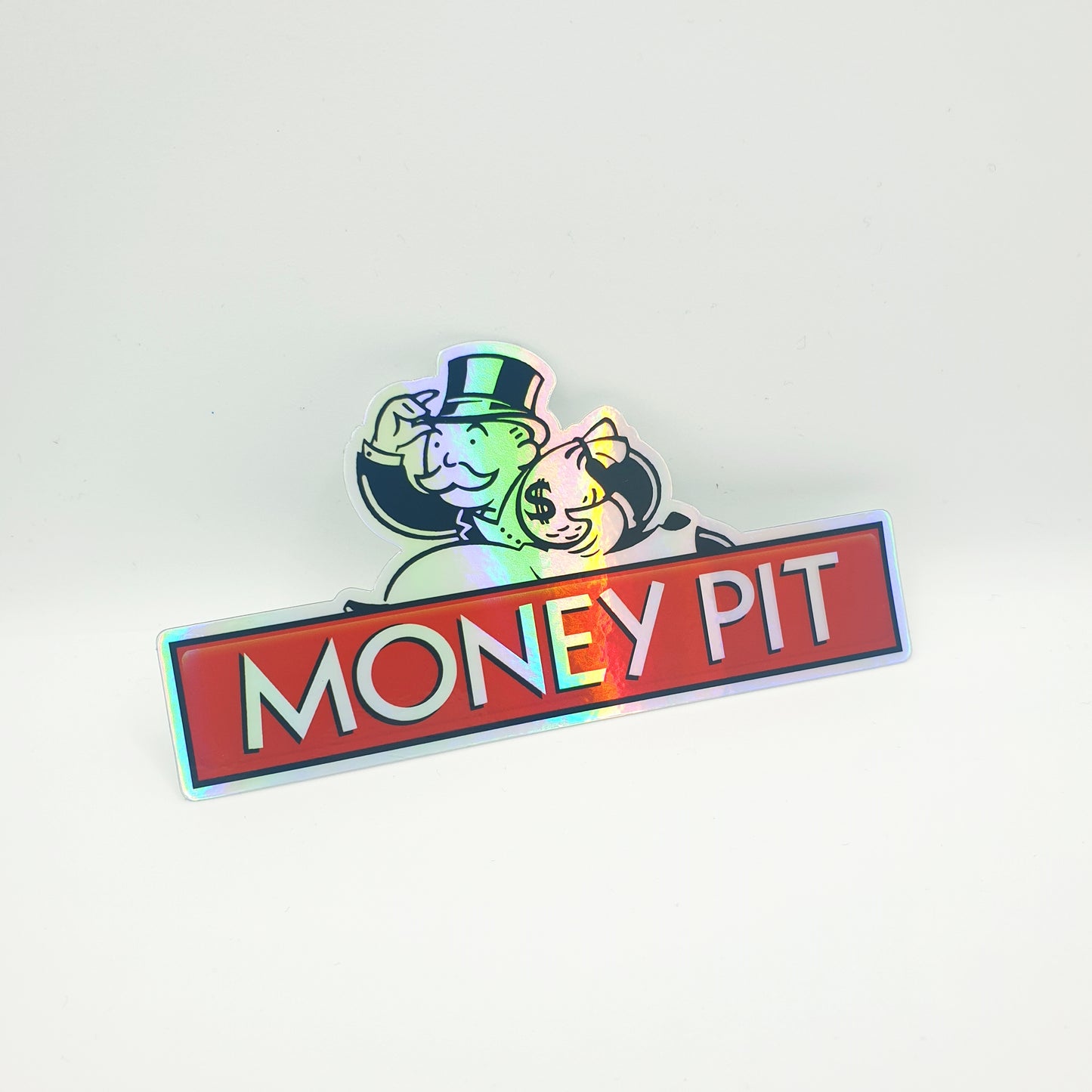 HOLOGRAPHIC MONEY PIT STICKER